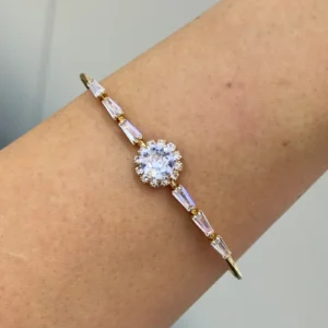 Bracelete zircônias baguete e flor em strass ouro